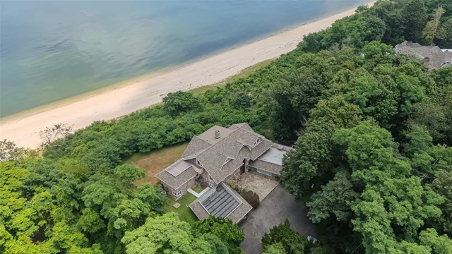 an aerial view of a house with outdoor space and street view