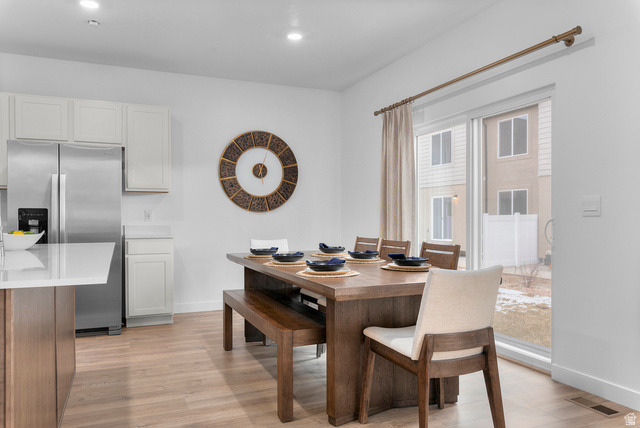 722 West 2840 South, Unit 8 Logan, UT 84321 - Photo 12 of 23 Dining space featuring light wood finished floors and recessed lighting