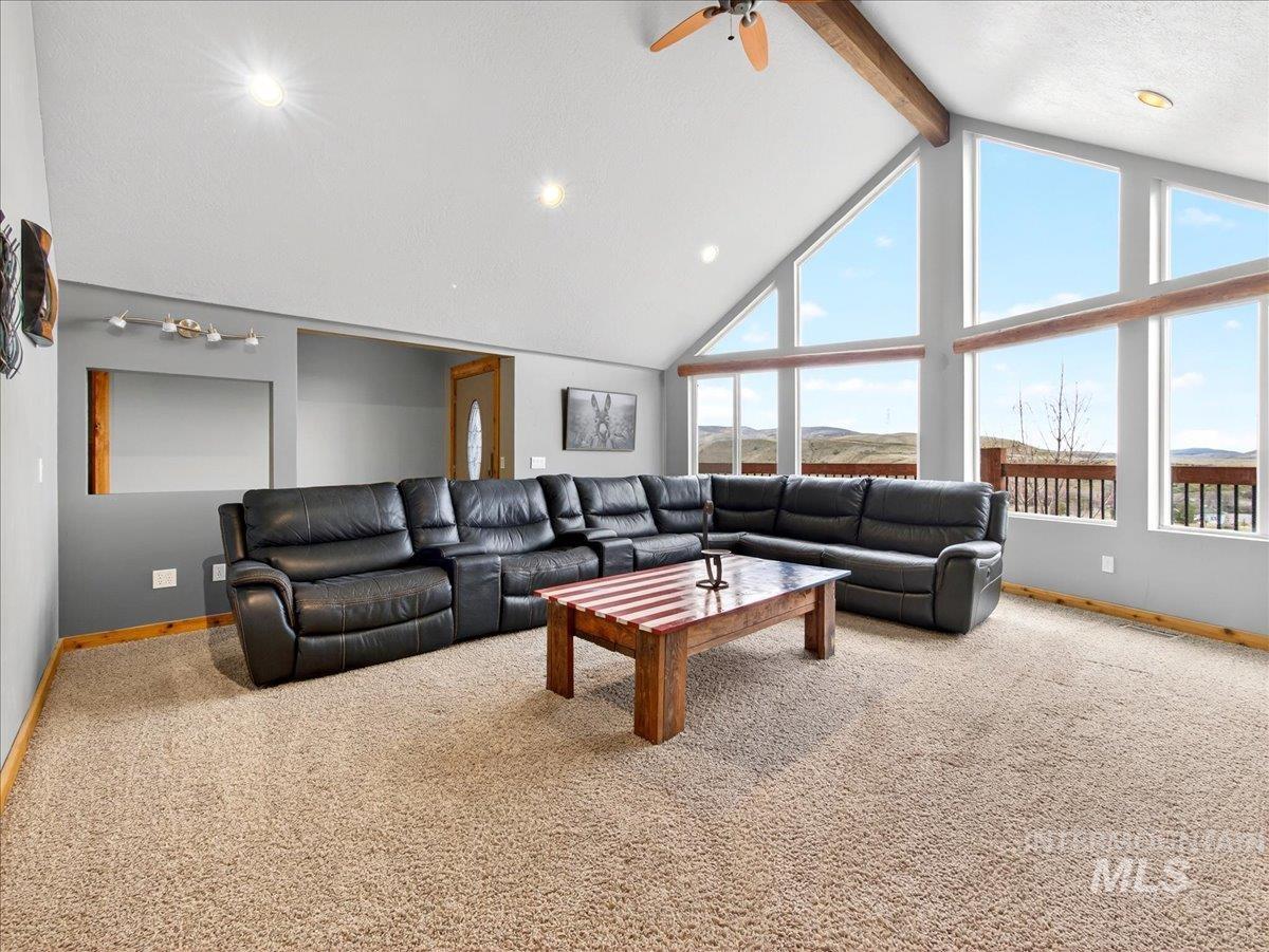 11714 Chukar Ridge Lane Horseshoe Bend, ID 83629 - Photo 15 of 50 Living room with carpet flooring, ceiling fan, and recessed lighting