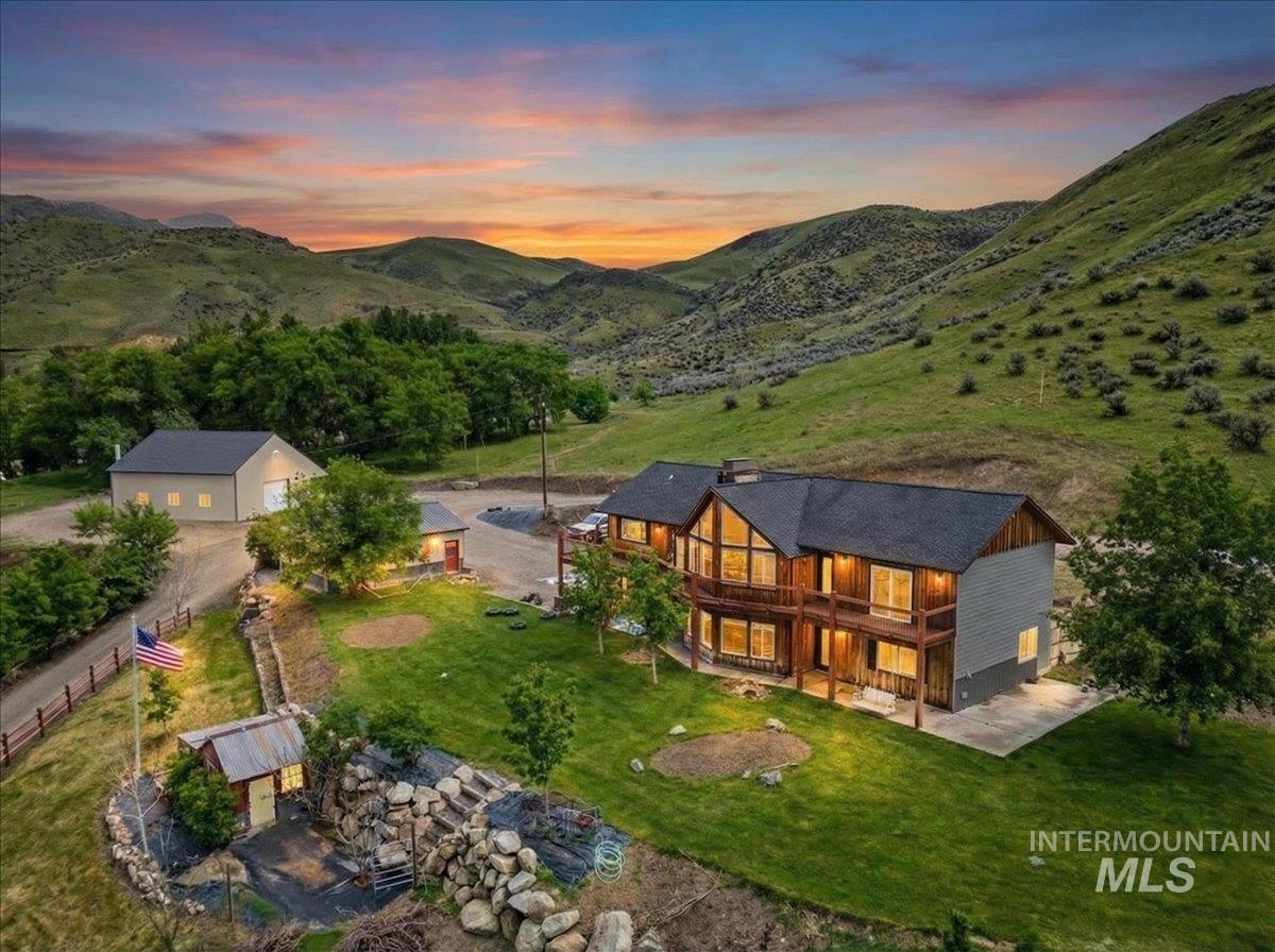 11714 Chukar Ridge Lane Horseshoe Bend, ID 83629 - Photo 2 of 50 Aerial view at dusk of a mountain view