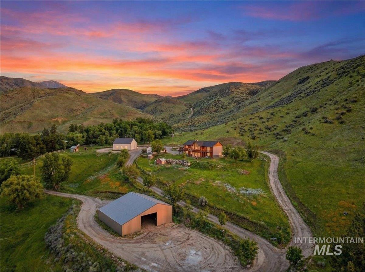 11714 Chukar Ridge Lane Horseshoe Bend, ID 83629 - Photo 5 of 50 Aerial view at dusk of a mountain view and a view of countryside