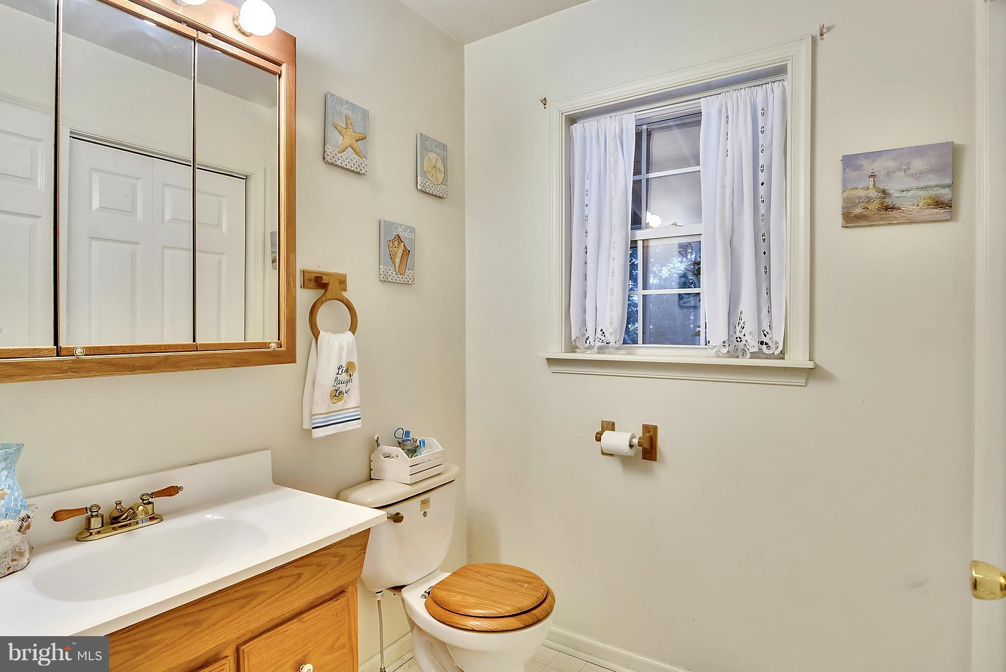 24882 Riverview Way Ridgely, MD 21660 - Photo 14 of 30 Main Level Half Bathroom