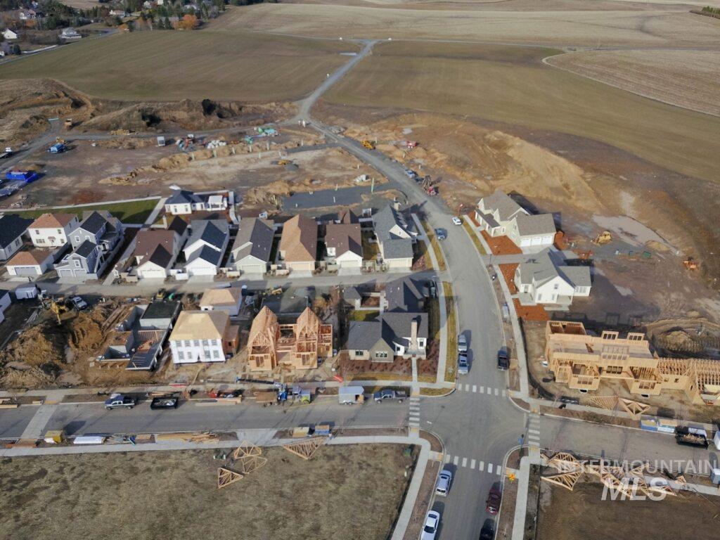 1354 Slonaker, Unit BISHOP Moscow, ID 83843 - Photo 21 of 29 Aerial view of property and surrounding area with nearby suburban area