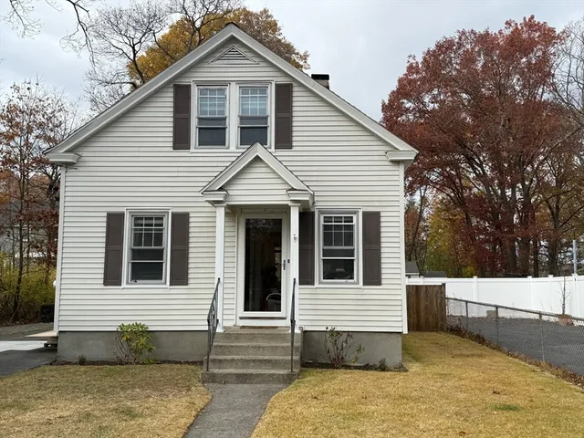 a front view of a house with a garage