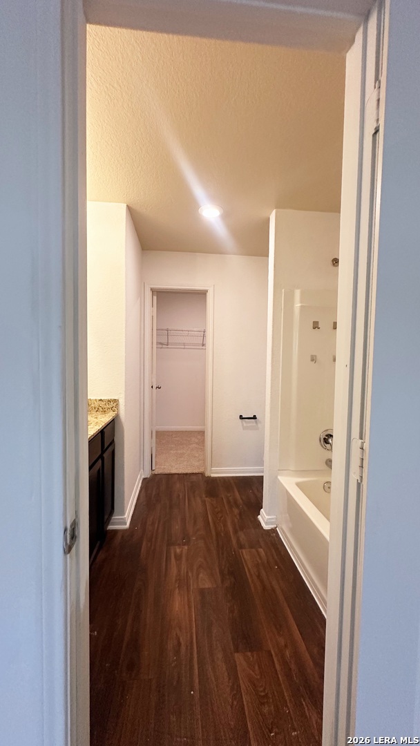 15230 Walcott Von Ormy, TX 78073 - Photo 8 of 10 a bathroom with a bathtub and a shower