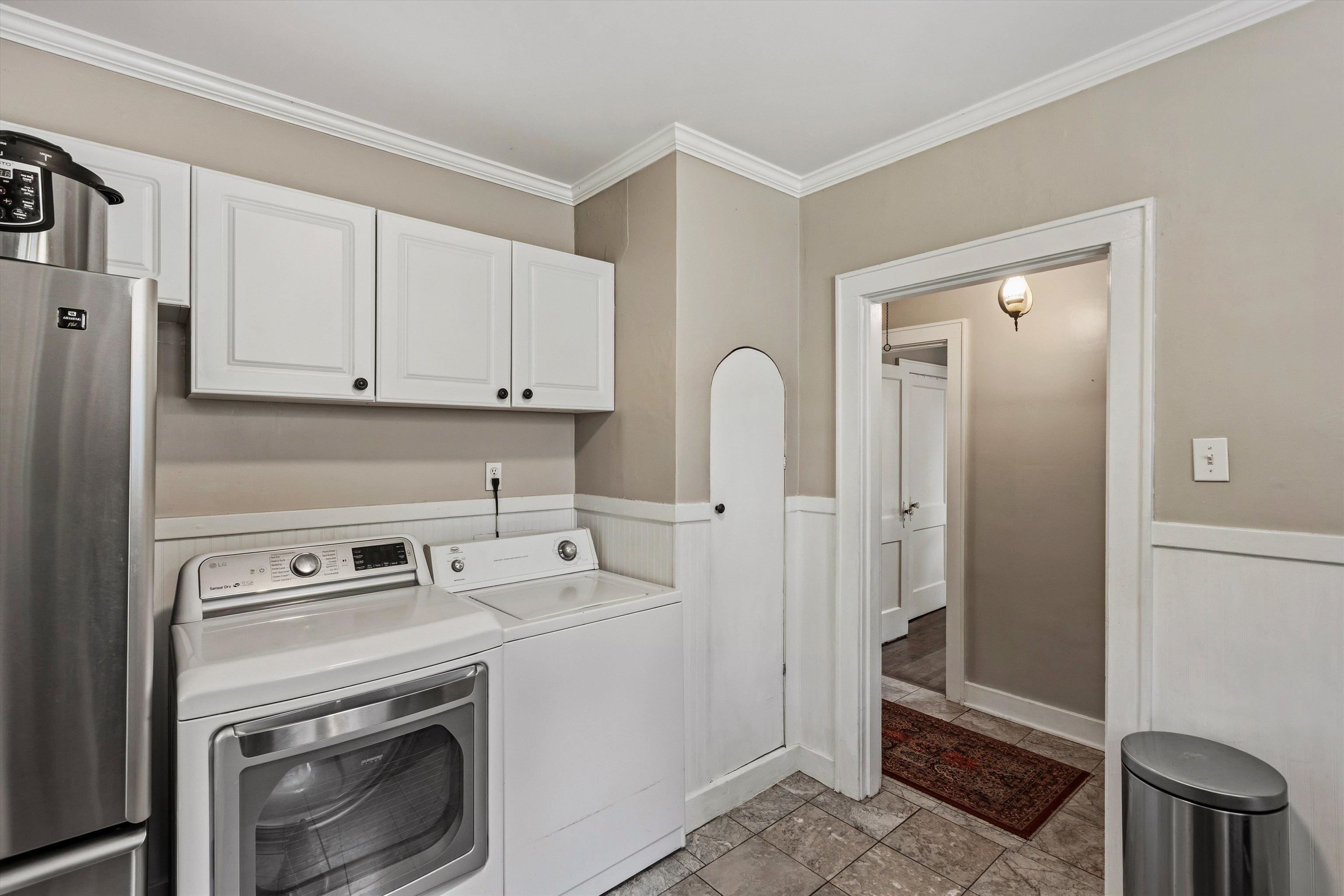 564 Alexander Street Memphis, TN 38111 - Photo 12 of 30 a kitchen with a refrigerator sink and cabinets