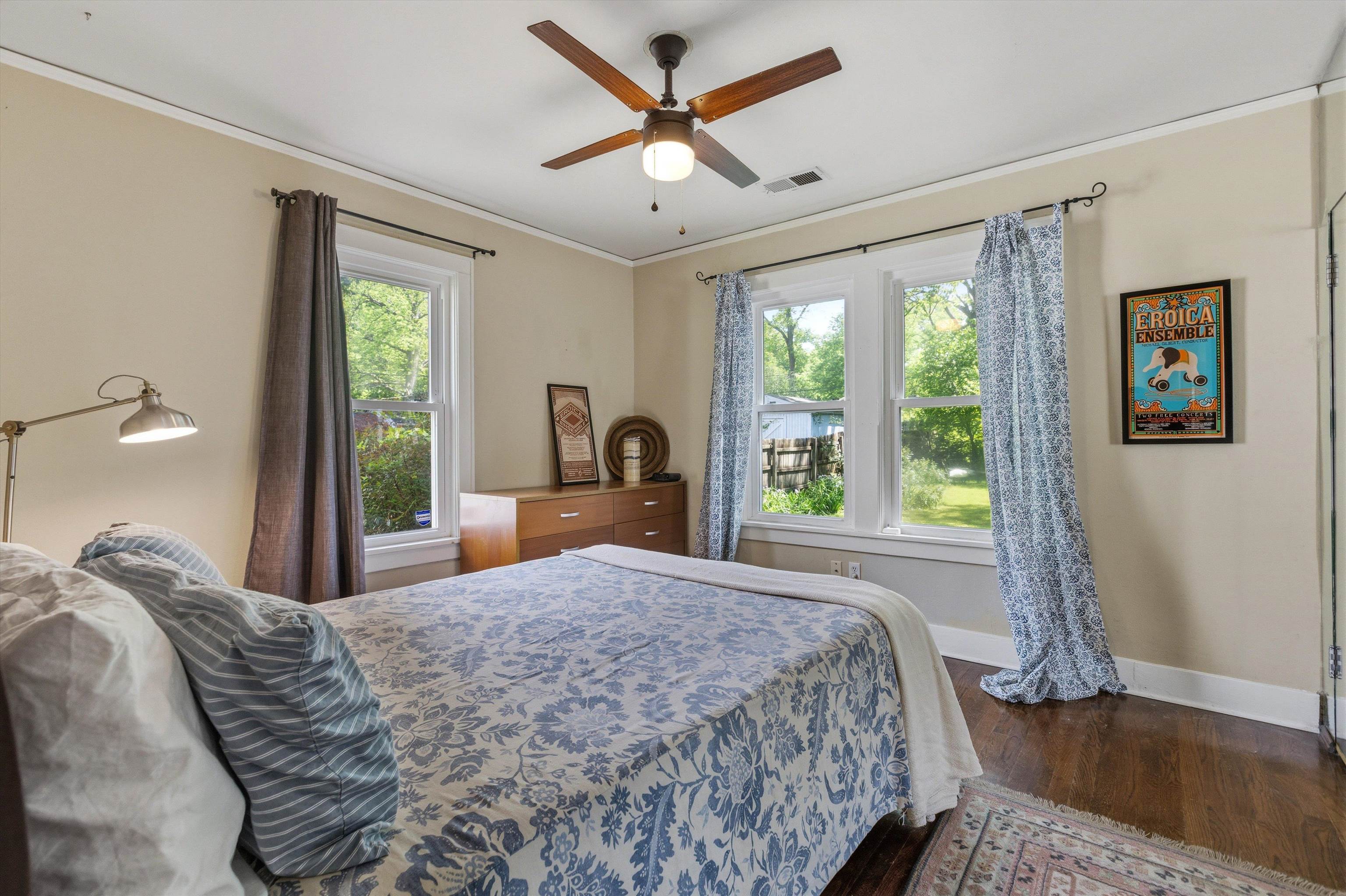 564 Alexander Street Memphis, TN 38111 - Photo 16 of 30 a bed sitting in a spacious bedroom next to a window