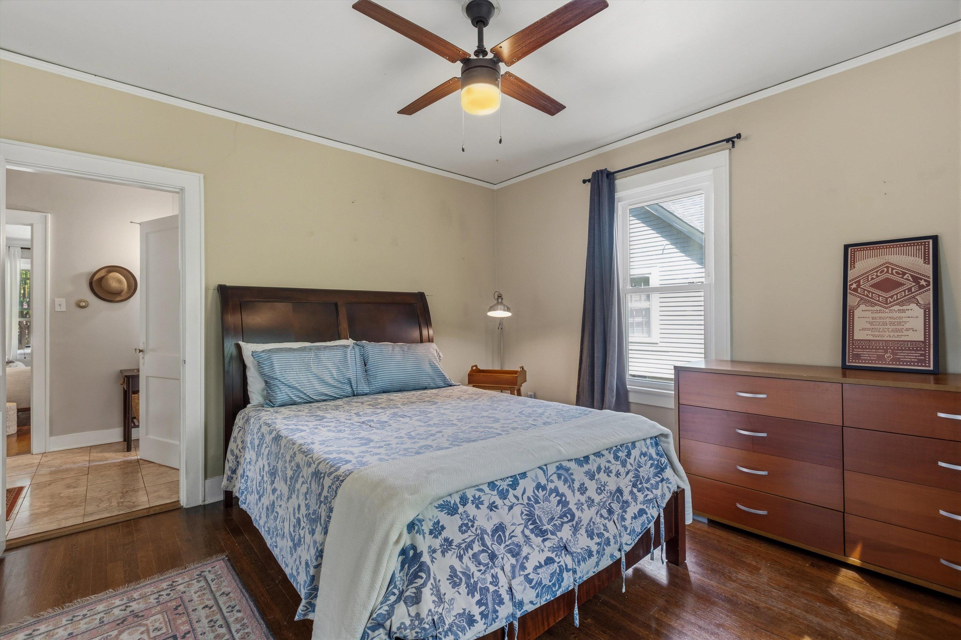 564 Alexander Street Memphis, TN 38111 - Photo 17 of 30 a bedroom with a bed and a dresser