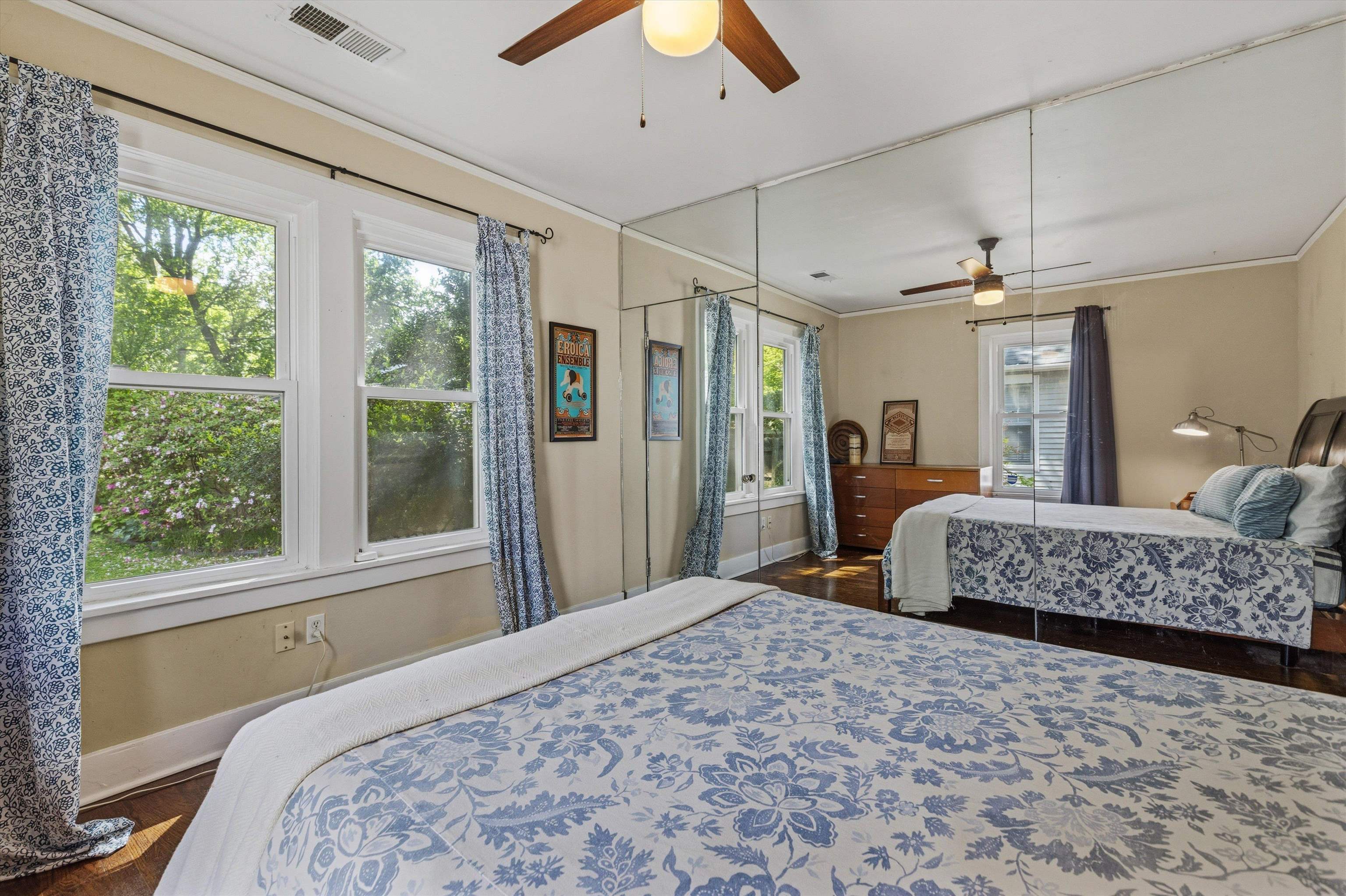 564 Alexander Street Memphis, TN 38111 - Photo 18 of 30 a bedroom with a large bed and a chandelier fan