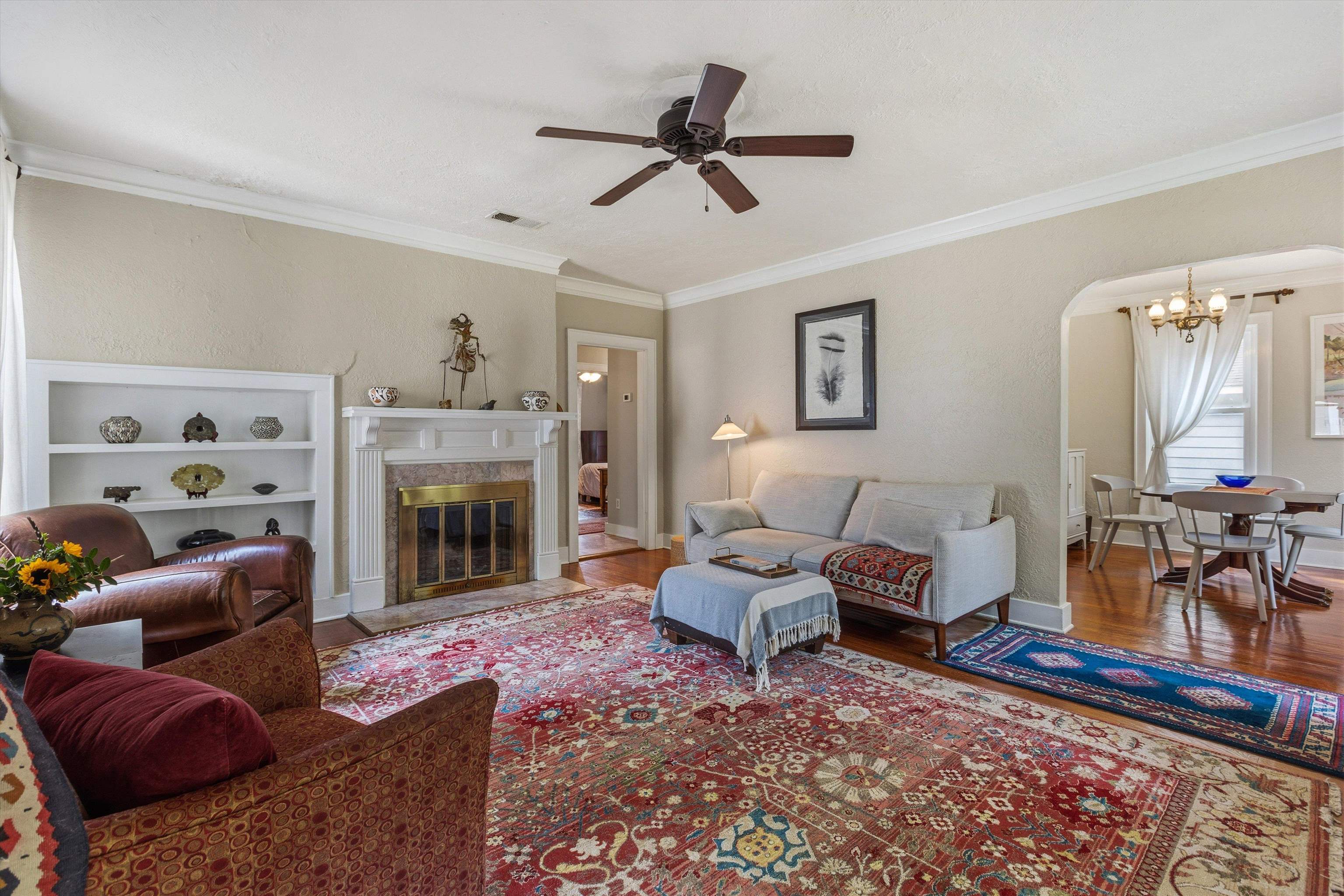 564 Alexander Street Memphis, TN 38111 - Photo 5 of 30 a living room with furniture and a fireplace