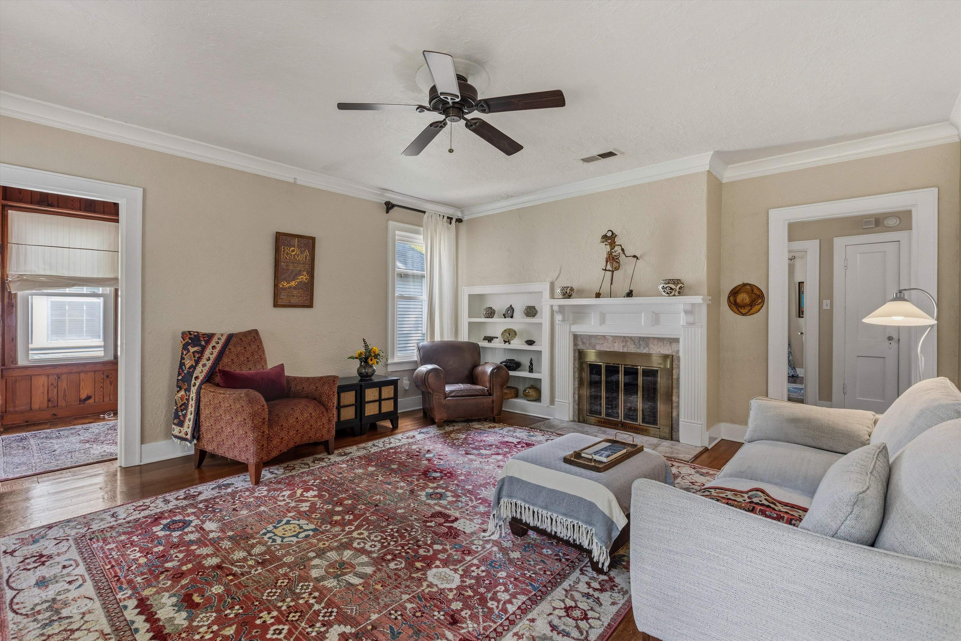 564 Alexander Street Memphis, TN 38111 - Photo 6 of 30 a living room with furniture and a fireplace