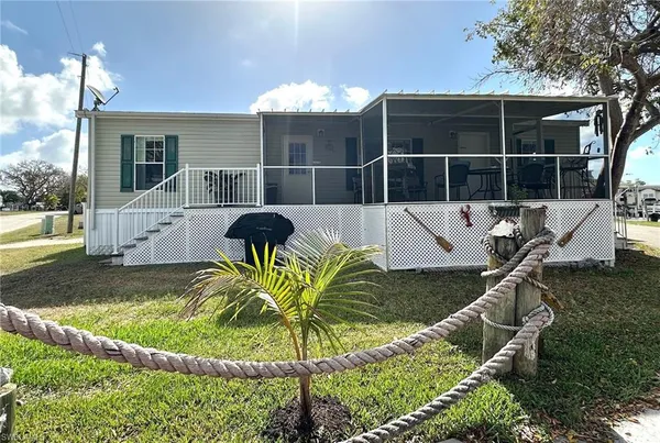 a view of a house with a patio