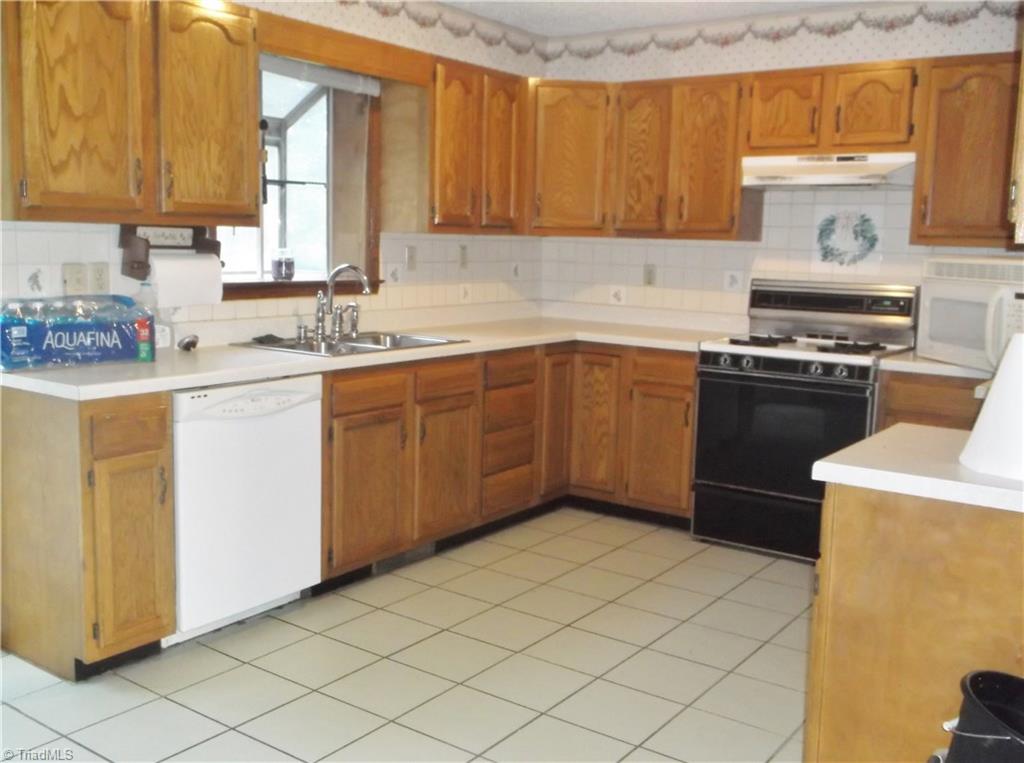 1099 Edwards Road Rural Hall, NC 27045 - Photo 13 of 20 Kitchen with Ceramic Tile Flooring Comes w/Stove & Dishwasher