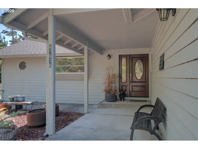 a house with trees in the background