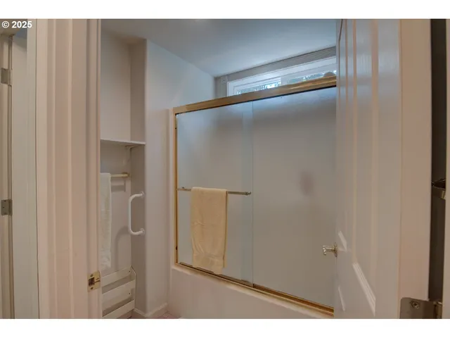 an aerial view of a house with outdoor space and street view