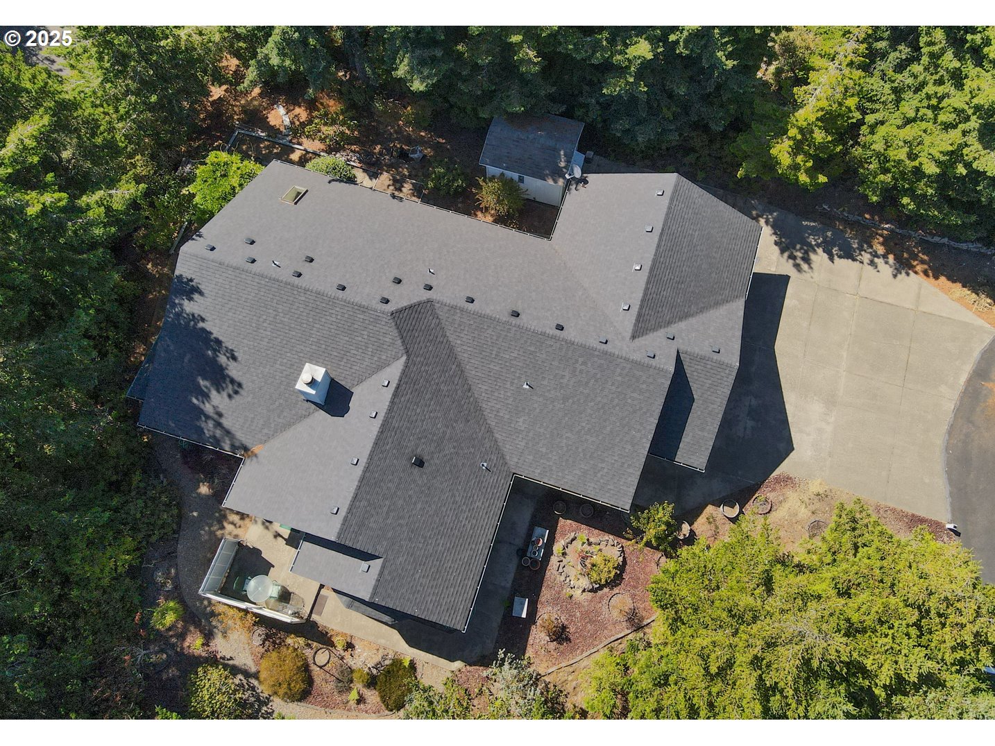 87630 Woodmere East Florence, OR 97439 - Photo 23 of 25 an aerial view of a house with outdoor space and street view