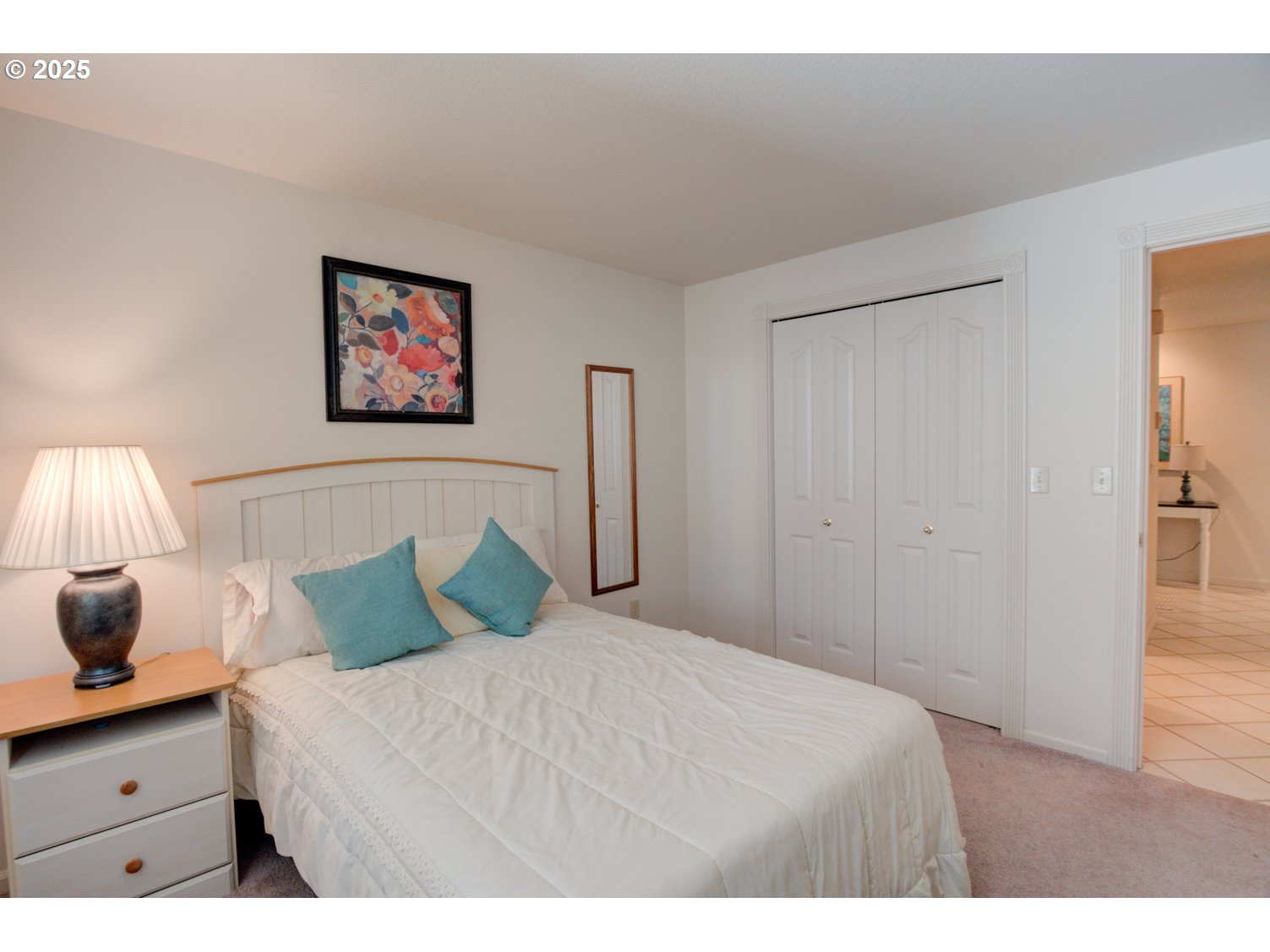 87630 Woodmere East Florence, OR 97439 - Photo 25 of 25 a bedroom with a bed and a flat screen tv