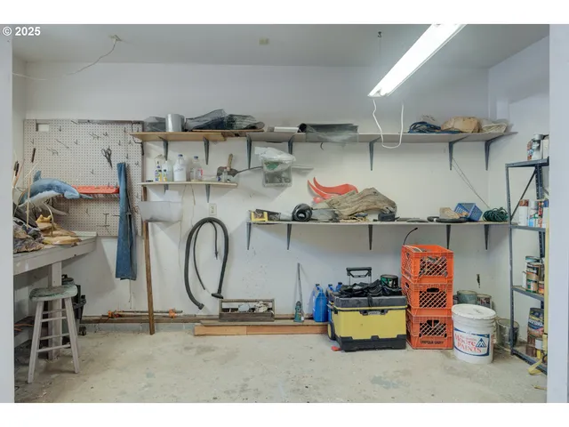 a view of kitchen with furniture and wooden floor