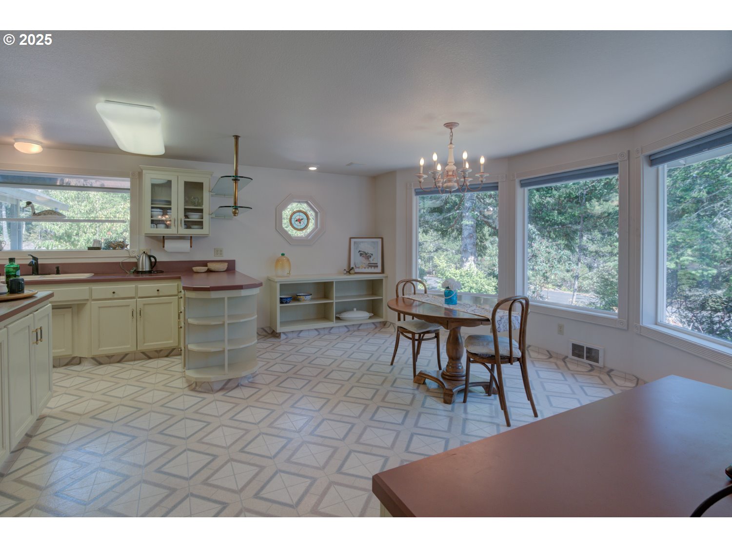 87630 Woodmere East Florence, OR 97439 - Photo 8 of 25 a view of a dining room with furniture window and outside view