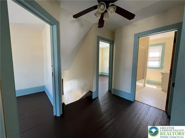 a view of entryway with wooden floor