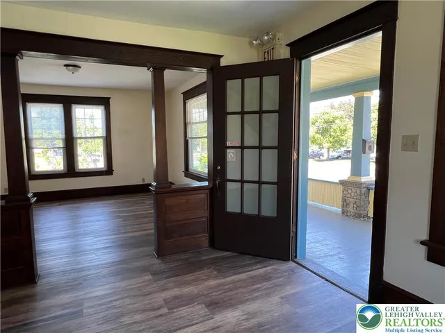 a view of livingroom with hardwood floor and window