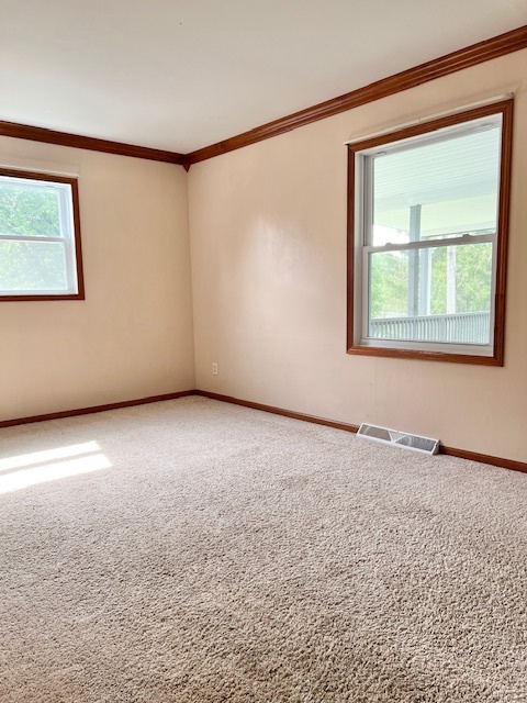 320 Prospect Street Dixon, IL 61021 - Photo 11 of 23 a view of an empty room with a window