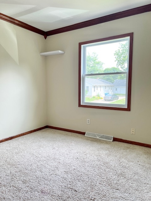 320 Prospect Street Dixon, IL 61021 - Photo 13 of 23 an empty room with a window
