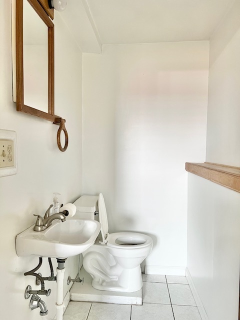 320 Prospect Street Dixon, IL 61021 - Photo 14 of 23 a bathroom with a sink and a mirror