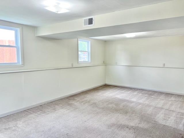 320 Prospect Street Dixon, IL 61021 - Photo 16 of 23 an empty room with a empty space and window