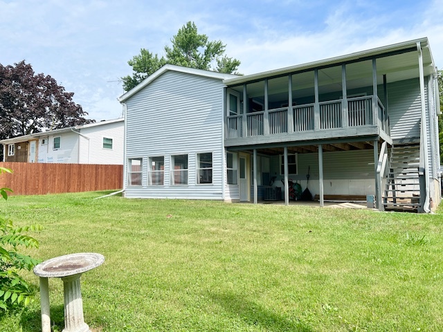 320 Prospect Street Dixon, IL 61021 - Photo 2 of 23 a view of a house with a backyard
