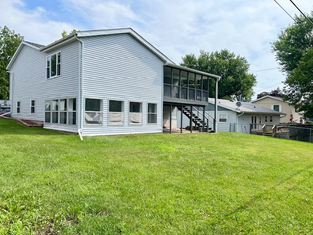 320 Prospect Street Dixon, IL 61021 - Photo 22 of 23 a view of a house with a backyard