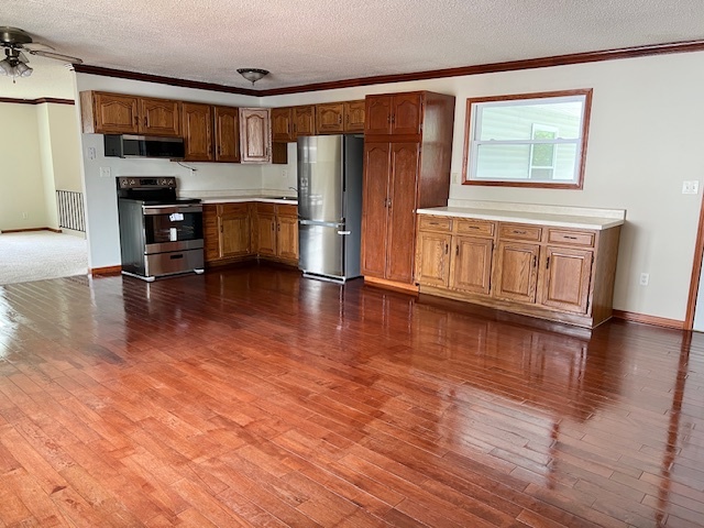 320 Prospect Street Dixon, IL 61021 - Photo 3 of 23 a view of kitchen with furniture and wooden floor
