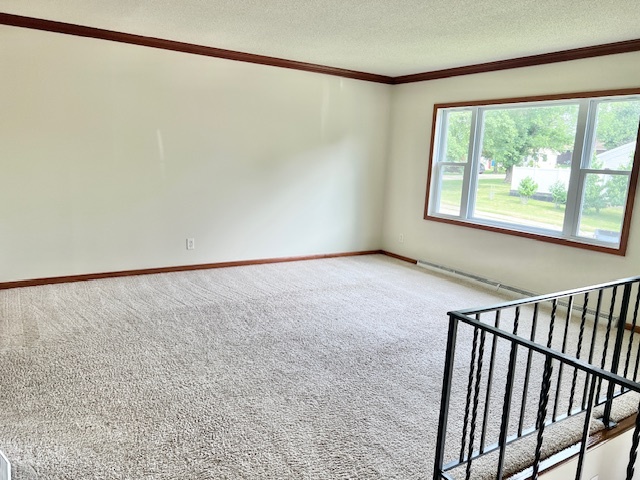 320 Prospect Street Dixon, IL 61021 - Photo 8 of 23 a view of an empty room with a window
