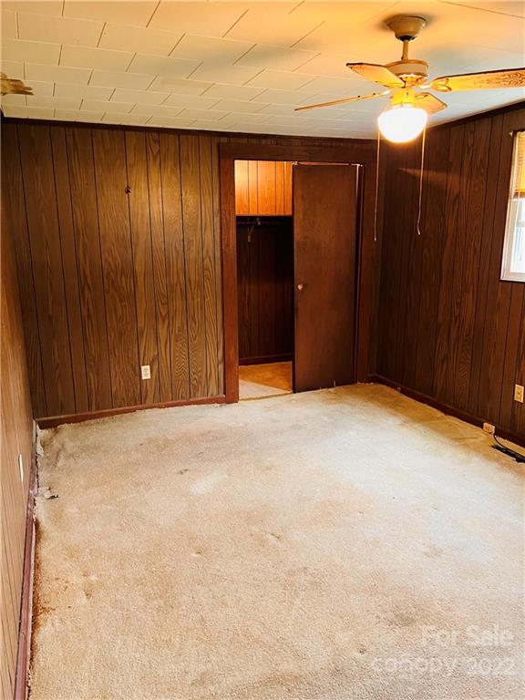 4080 Piney Road Morganton, NC 28655 - Photo 18 of 26 a view of an empty room with a fan