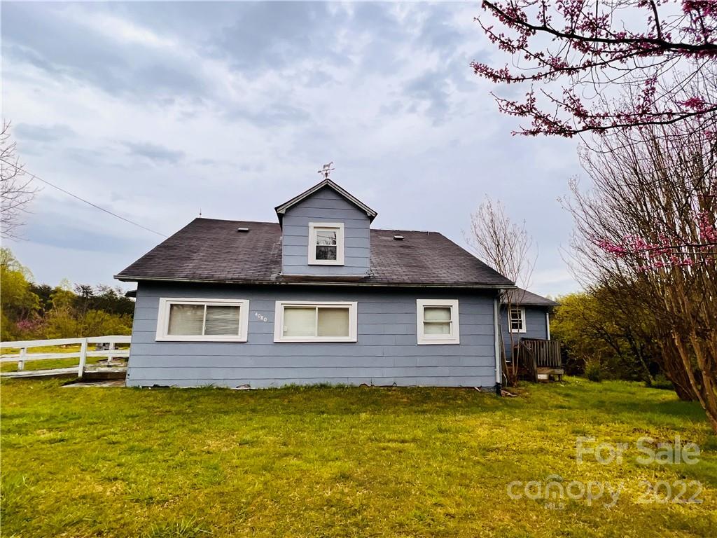 4080 Piney Road Morganton, NC 28655 - Photo 2 of 26 a front view of a house with a yard