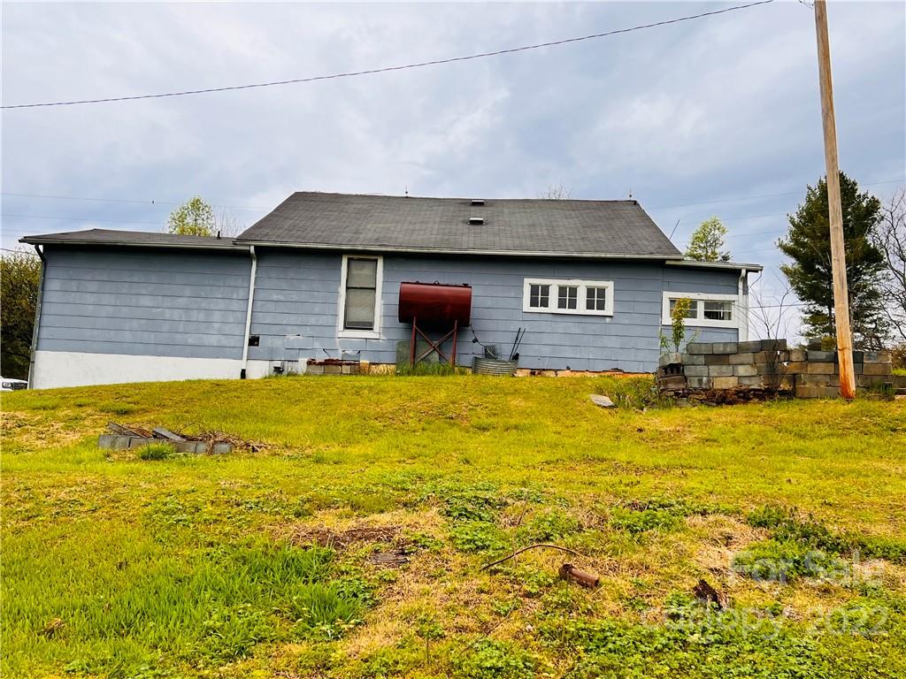 4080 Piney Road Morganton, NC 28655 - Photo 5 of 26 a house view with swimming pool in front of it