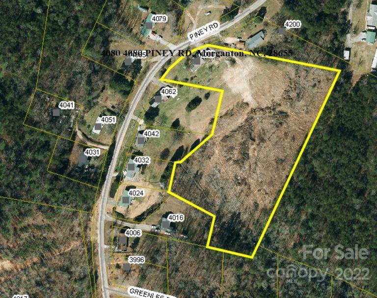 4080 Piney Road Morganton, NC 28655 - Photo 9 of 26 an aerial view of a house with a space and a swimming pool