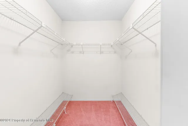 a view of a room with racks on the wall