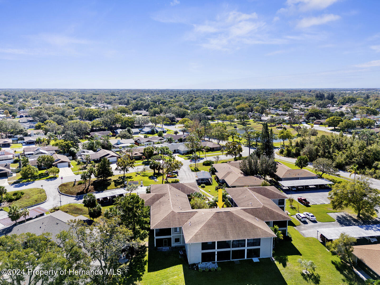 7721 Cosme Drive Hudson, FL 34667 - Photo 26 of 28 an aerial view of a city with lots of residential buildings