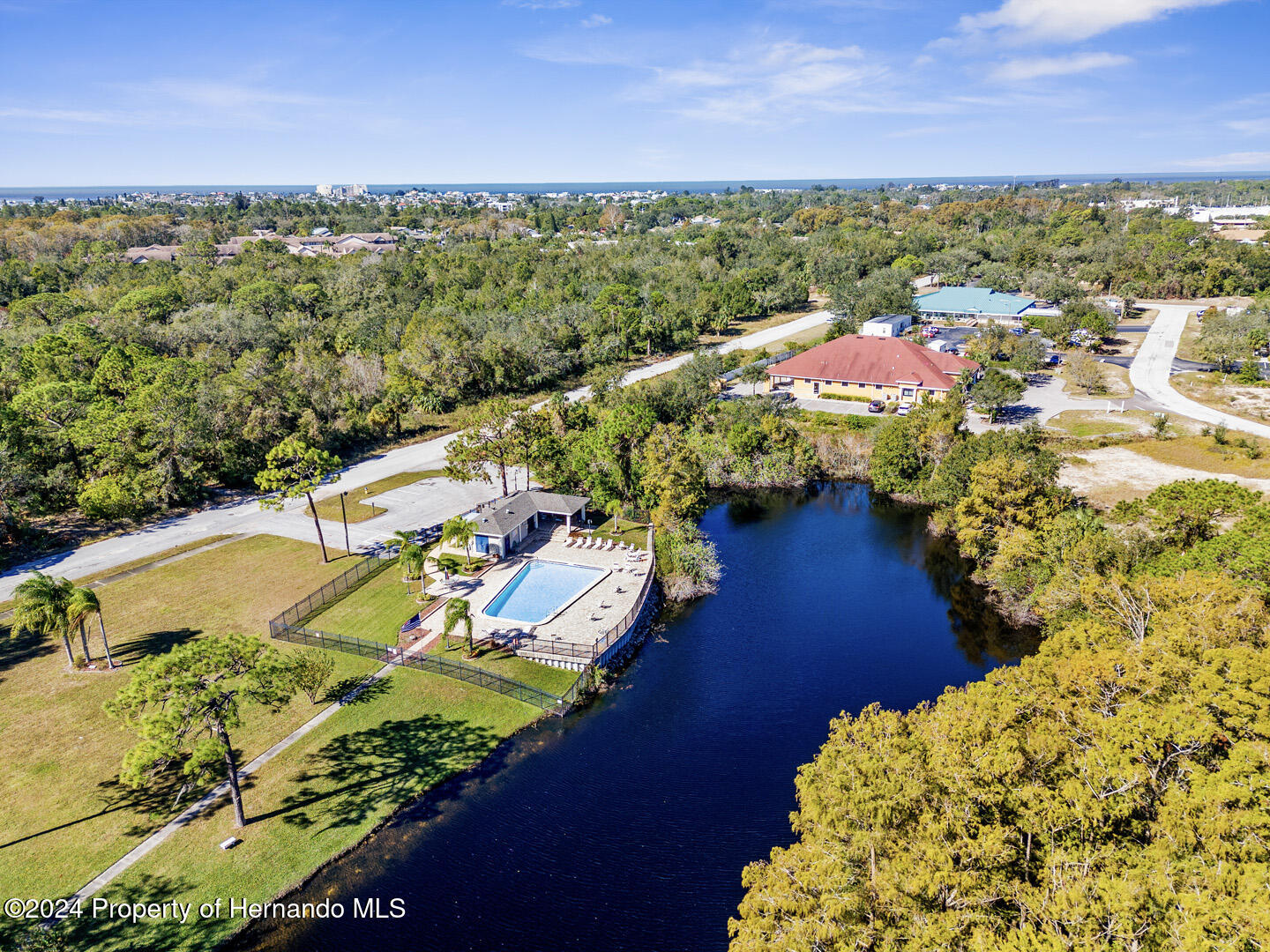 7721 Cosme Drive Hudson, FL 34667 - Photo 27 of 28 an aerial view of a house with a ocean view