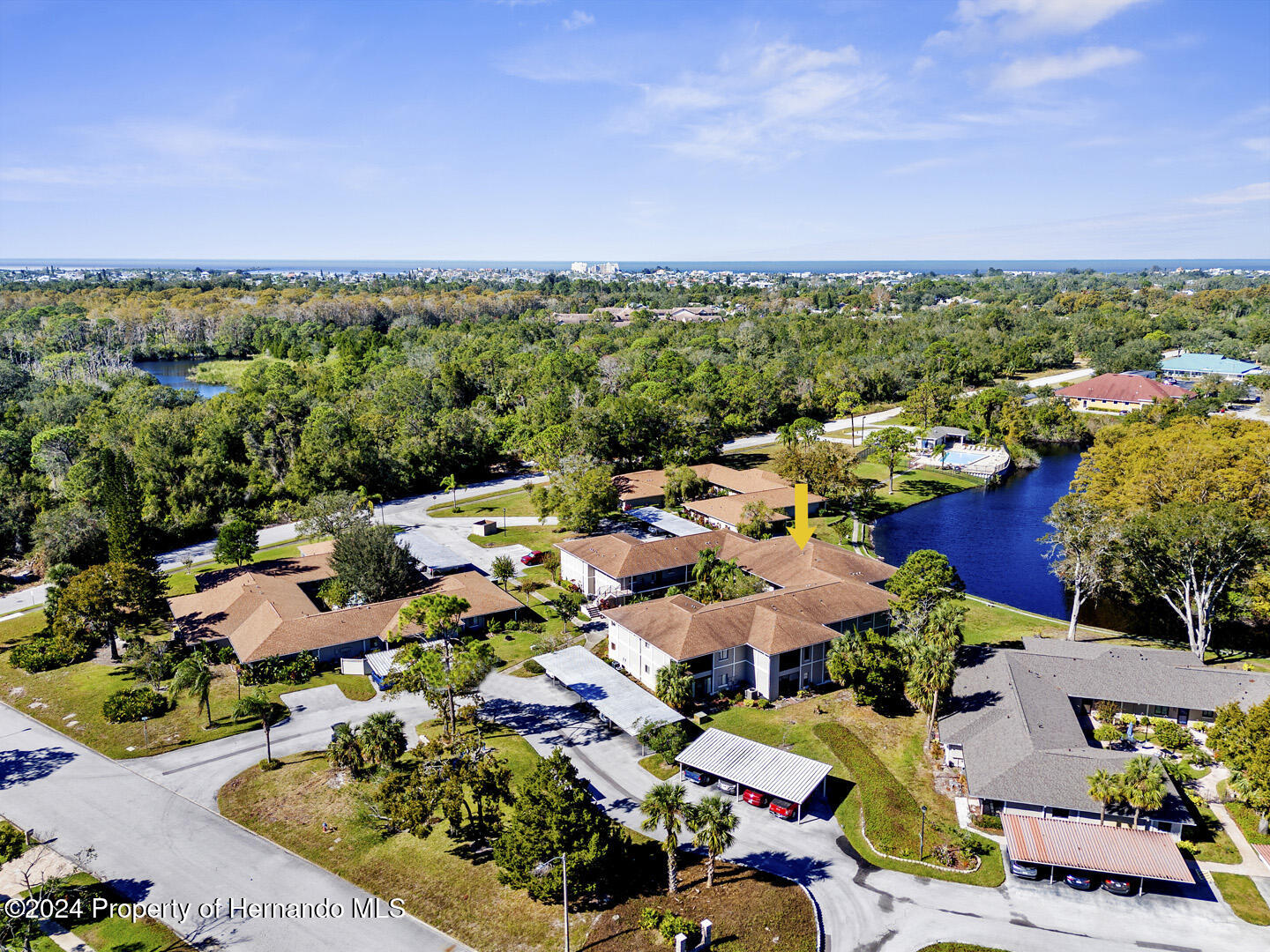 7721 Cosme Drive Hudson, FL 34667 - Photo 28 of 28 an aerial view of a houses with outdoor space