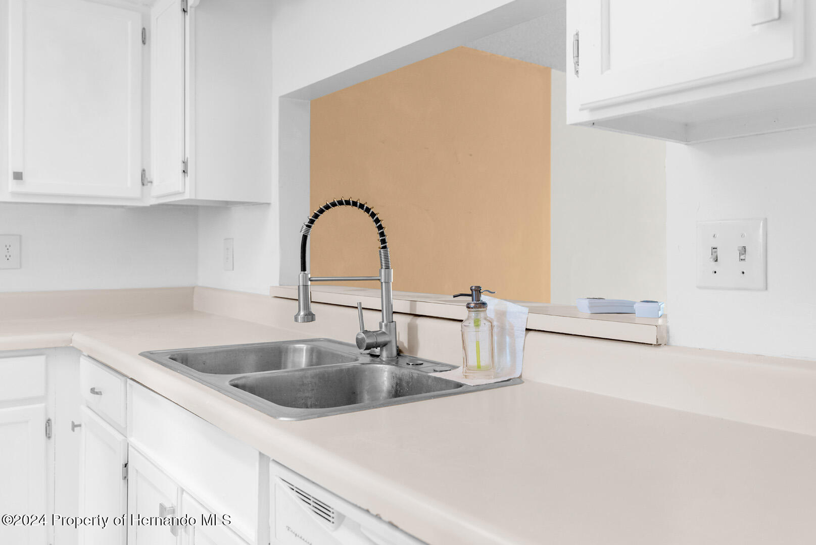 7721 Cosme Drive Hudson, FL 34667 - Photo 8 of 28 a close view of sink and tap