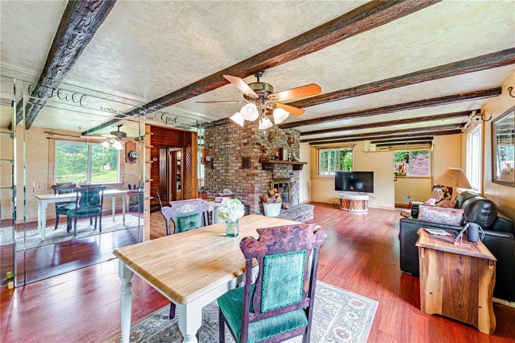 174 Keffer Road Dawson, PA 15428 - Photo 13 of 28 a view of a dining room with furniture window and wooden floor