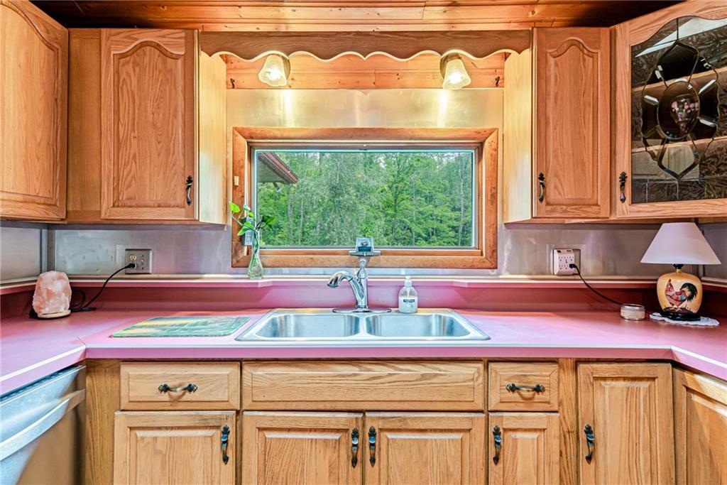 174 Keffer Road Dawson, PA 15428 - Photo 17 of 28 a kitchen with a stove and a white cabinets