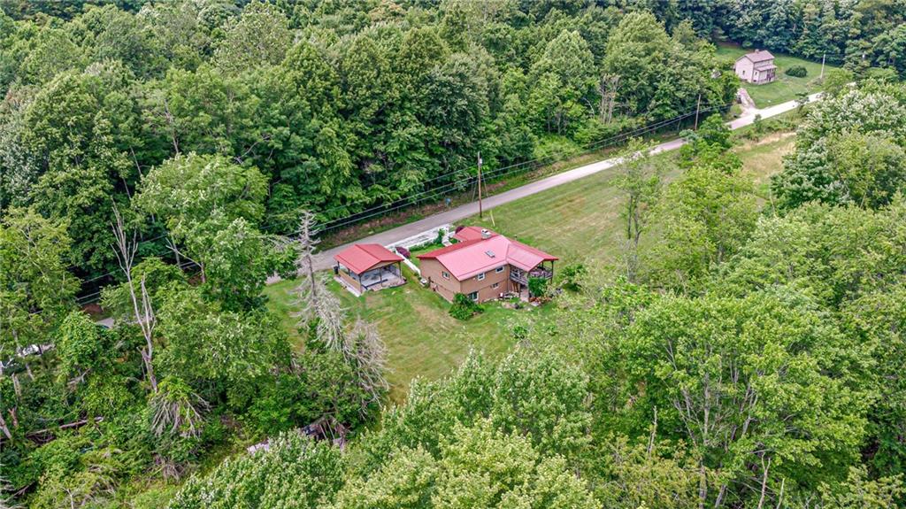 174 Keffer Road Dawson, PA 15428 - Photo 6 of 28 an outdoor space with lots of bushes