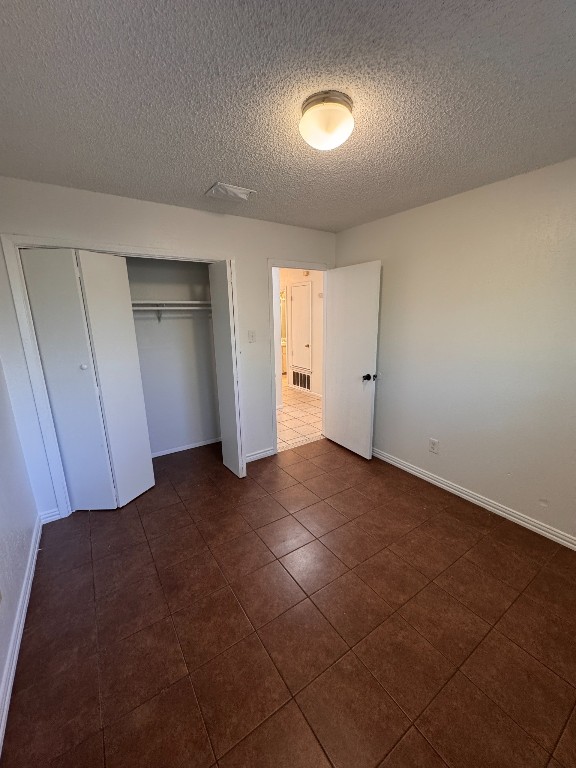 11405 Ptarmigan Drive, Unit A Austin, TX 78758 - Photo 15 of 20 an empty room with a natural light
