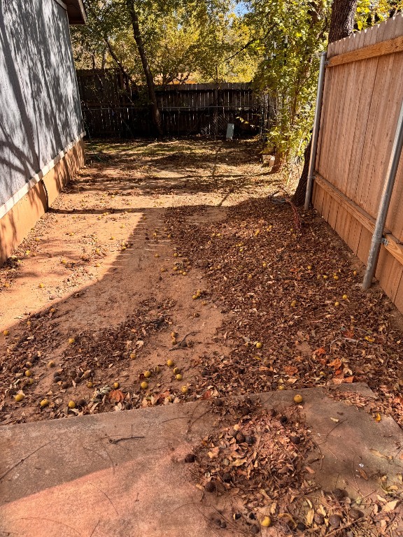 11405 Ptarmigan Drive, Unit A Austin, TX 78758 - Photo 20 of 20 a view of yard with wooden fence