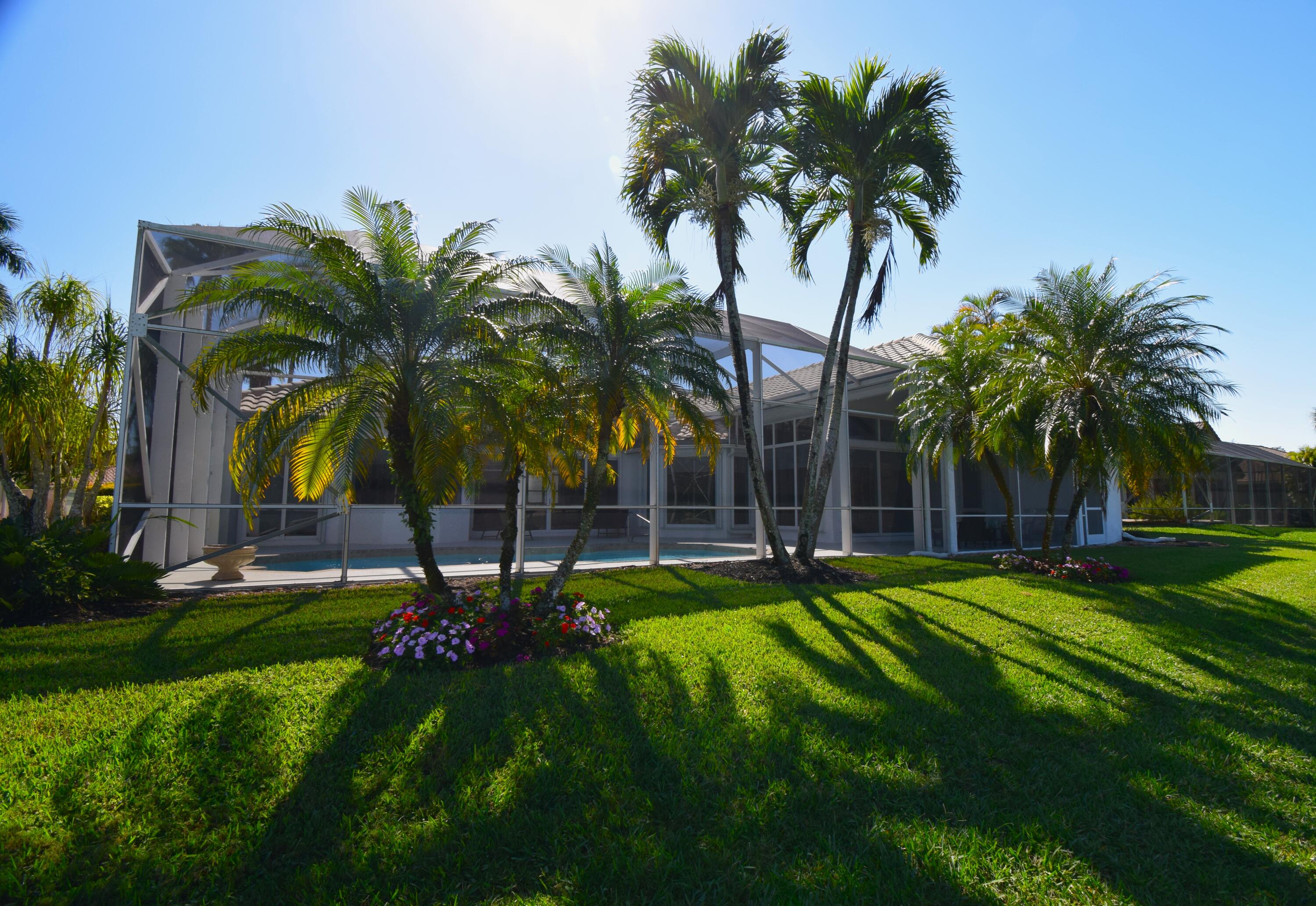 10550 Stonebridge Boulevard Boca Raton, FL 33498 - Photo 31 of 37 Landscaped Yard