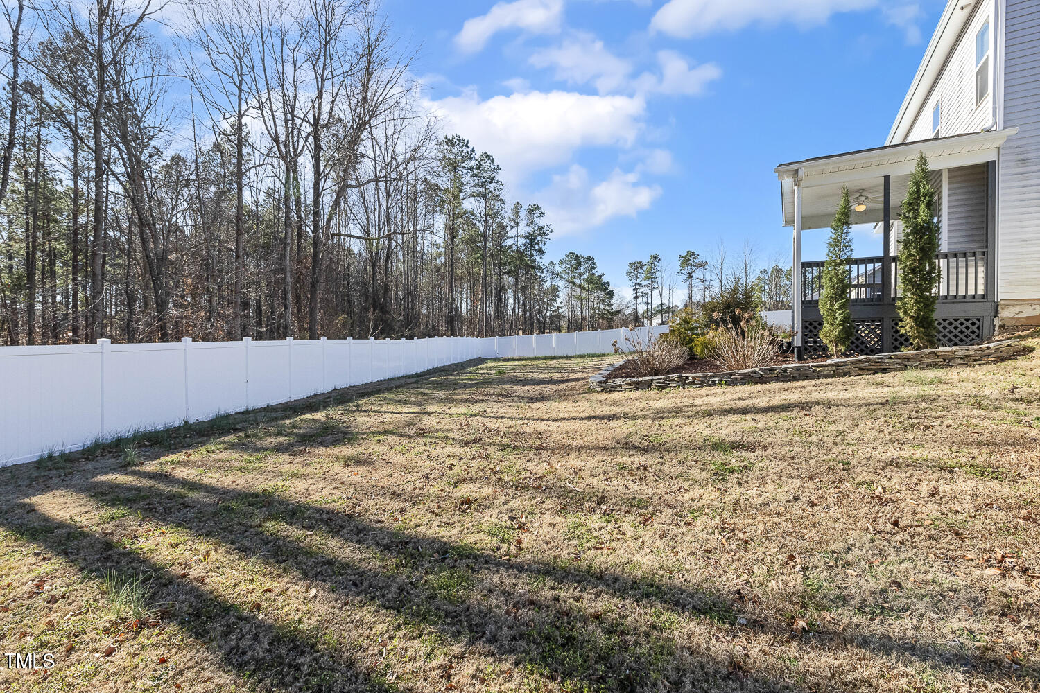 192 Springhill Lane Garner, NC 27529 - Photo 42 of 43 Vinyl privacy fencing surrounds large back yard.