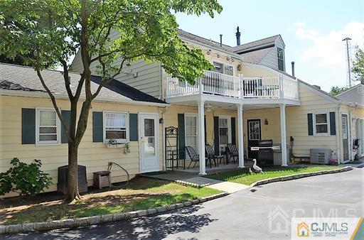 596 Old Post Road Edison, NJ 08817 - Photo 2 of 13 a front view of a house with garden